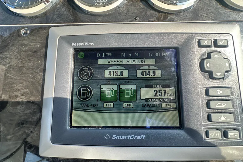 Slide: The Image of VesselView display on 2014 Sea Ray 450 Sedan Bridge showing fuel status and engine data. - 10