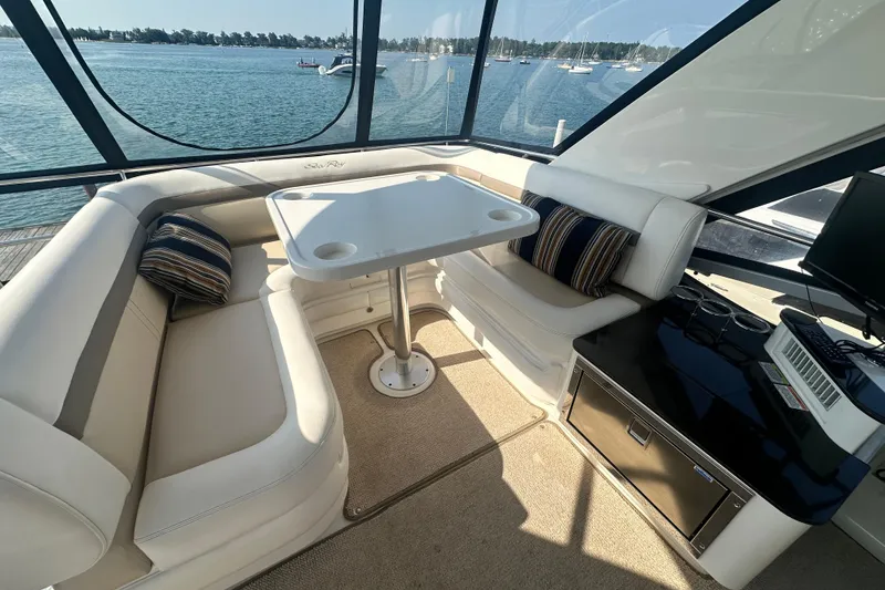 Slide: The Image of Luxurious interior of 2014 Sea Ray 450 Sedan Bridge yacht with waterfront view. - 20