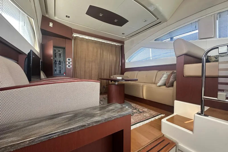 Slide: The Image of Luxurious interior of 2014 Sea Ray 450 Sedan Bridge yacht with elegant seating and modern design. - 34