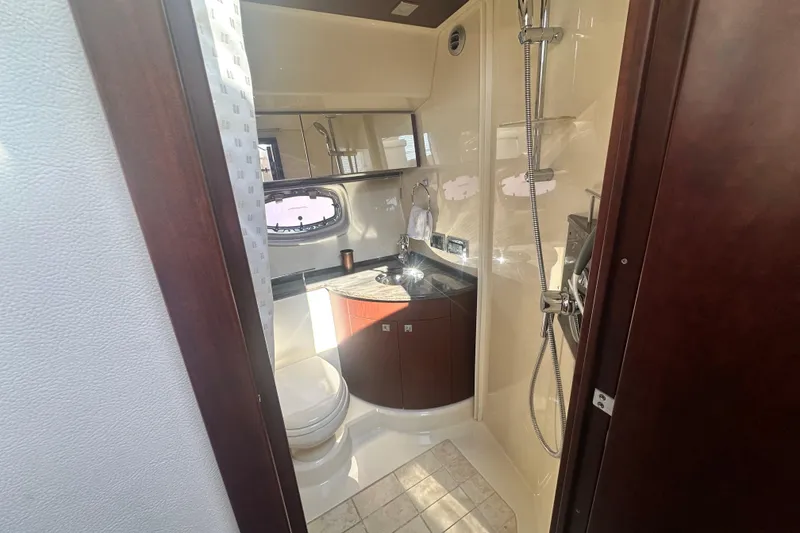 Slide: The Image of Luxurious bathroom in 2014 Sea Ray 450 Sedan Bridge yacht with shower and vanity. - 42