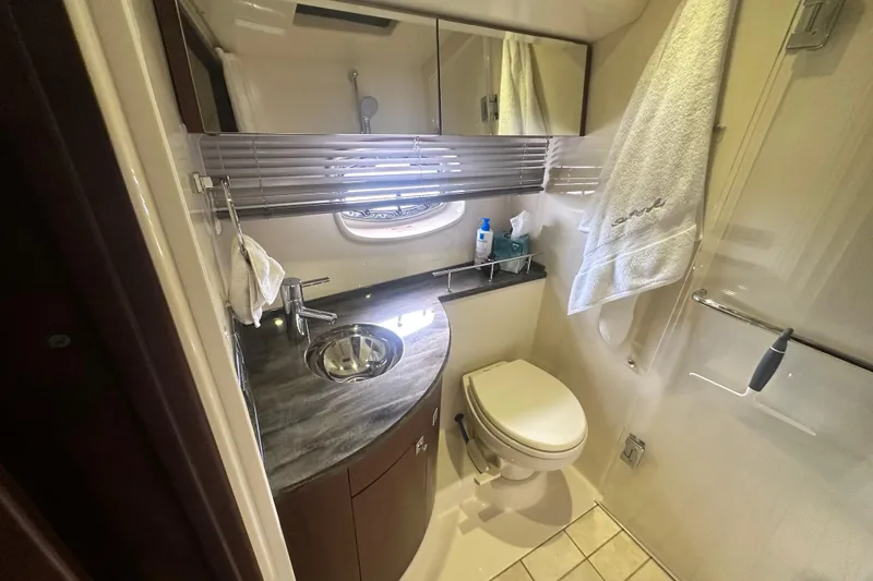 Slide: The Image of Luxurious bathroom in 2014 Sea Ray 450 Sedan Bridge yacht with modern fixtures. - 49