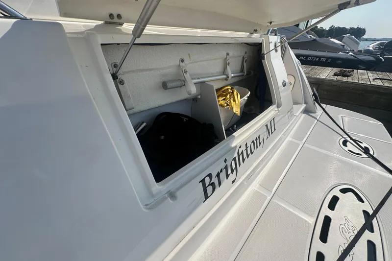 Slide: The Image of 2014 Sea Ray 450 Sedan Bridge boat storage compartment, Brighton, MI, docked by the water. - 71