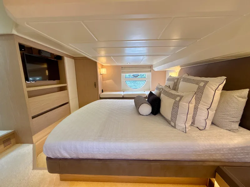 Slide: The Image of Luxurious bedroom interior of 2017 Beneteau Monte Carlo 5S yacht with elegant bedding. - 10