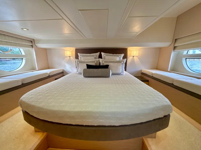 Slide: The Image of Luxurious bedroom interior of 2017 Beneteau Monte Carlo 5S yacht with elegant bedding. - 12