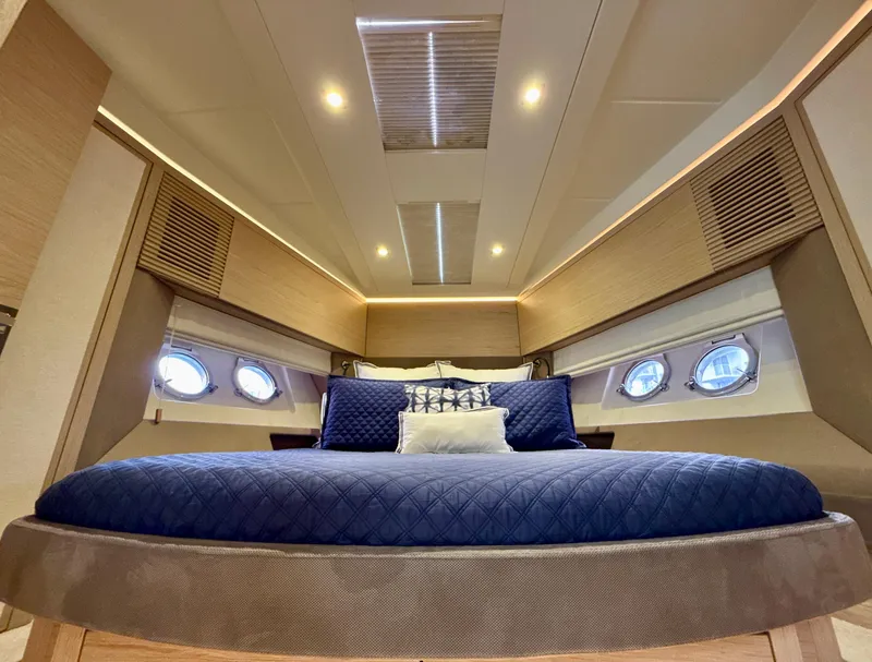 Slide: The Image of Luxurious cabin interior of 2017 Beneteau Monte Carlo 5S yacht with elegant bedding. - 18