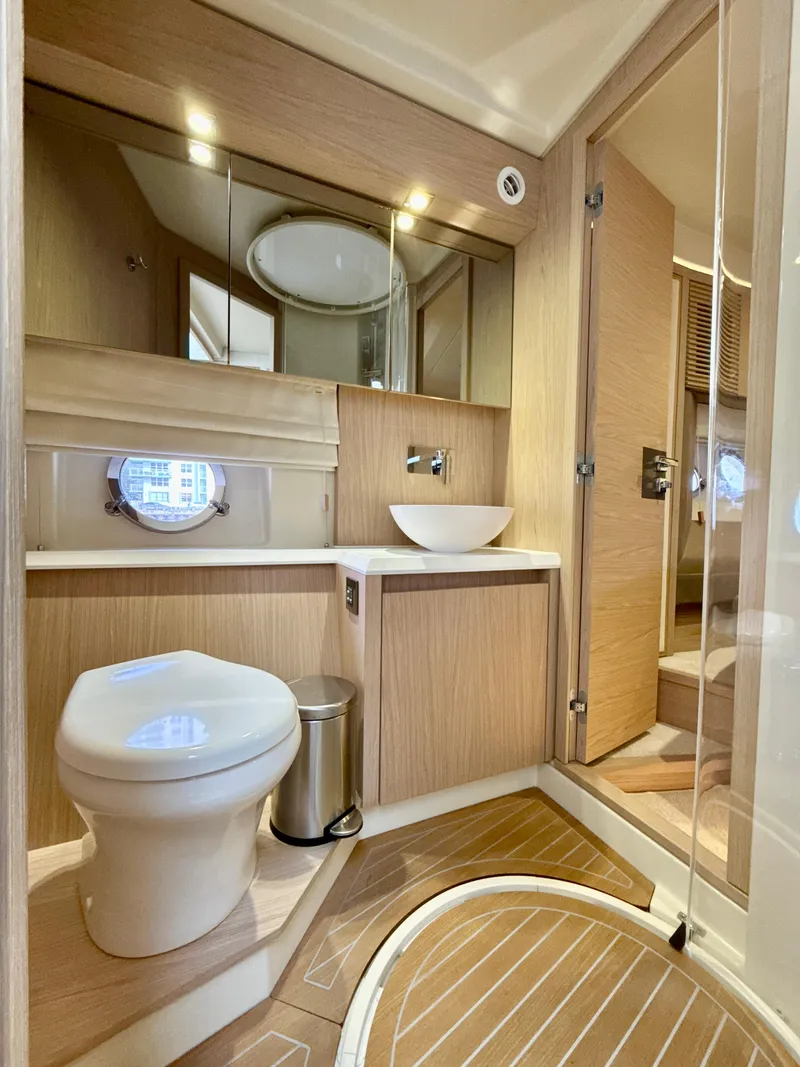 Slide: The Image of Luxurious bathroom in 2017 Beneteau Monte Carlo 5S yacht with modern fixtures. - 19