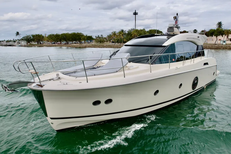 Slide: The Image of 2017 Beneteau Monte Carlo 5S yacht cruising on calm waters. - 33
