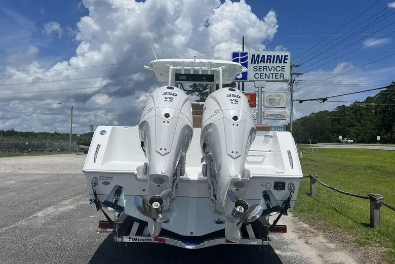 Slide: The Image of 2026 Sea Hunt Gamefish 30 with twin 350 V8 engines at marine service center. - 14