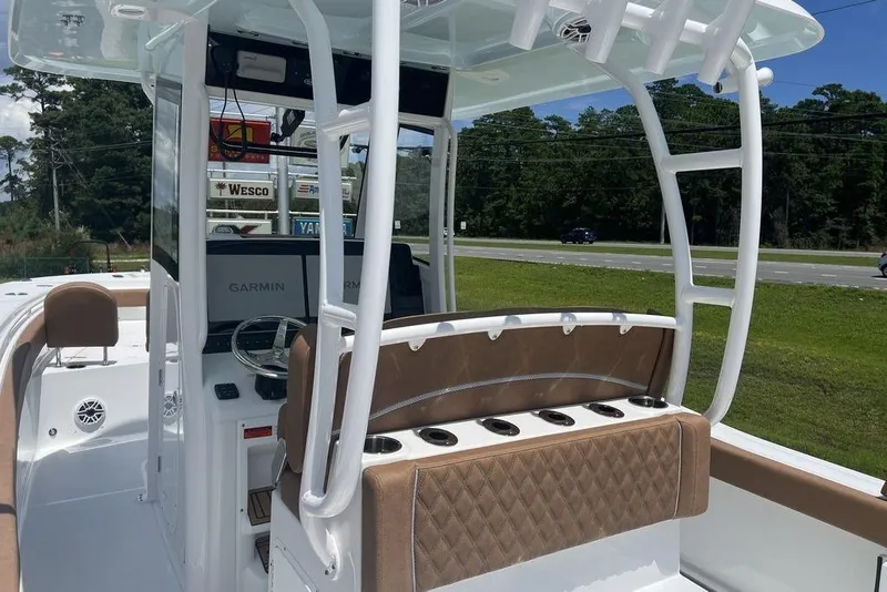 Slide: The Image of 2026 Sea Hunt Gamefish 30 boat interior with Garmin electronics and forward seating. - 29