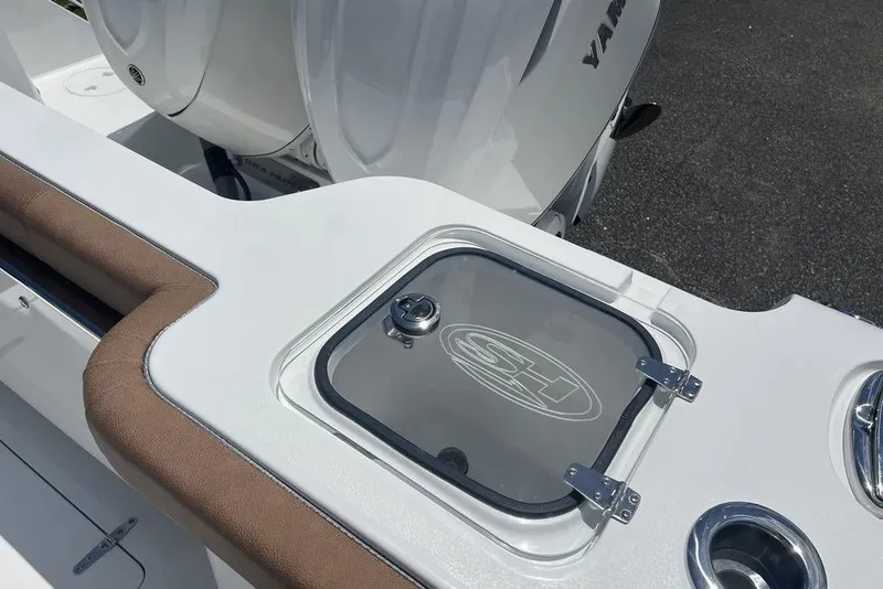 Slide: The Image of 2026 Sea Hunt Gamefish 30 boat with forward seating and Yamaha engines. - 30