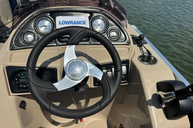 Slide: The Image of Steering console of 2019 G3 X22FC boat with Lowrance system and gauges. - 13