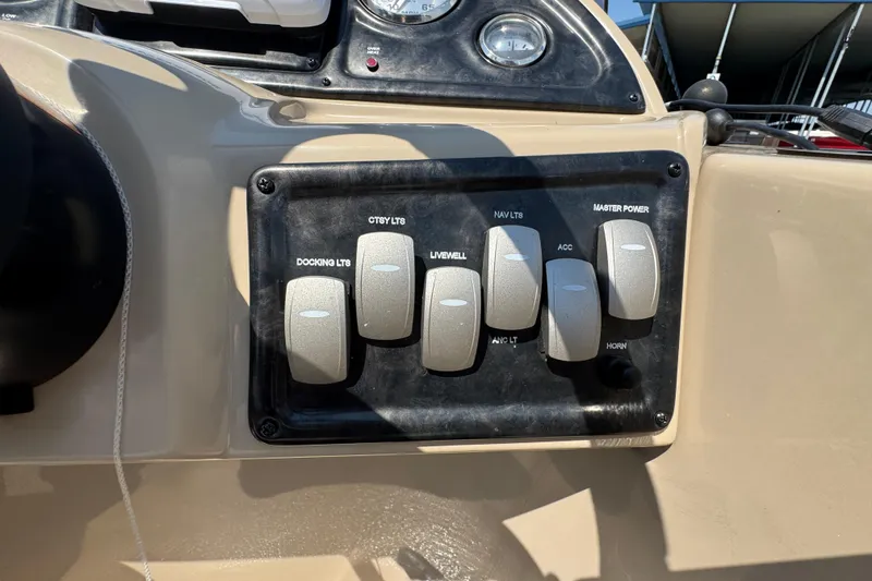 Slide: The Image of Control panel of a 2019 G3 X22FC boat with labeled switches. - 16