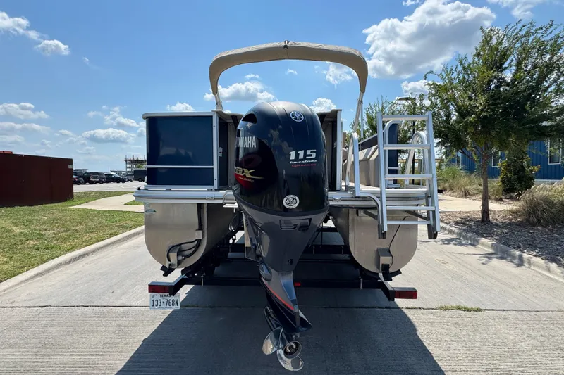Slide: The Image of 2019 G3 X22FC pontoon boat with Yamaha 115 engine on a sunny day. - 9