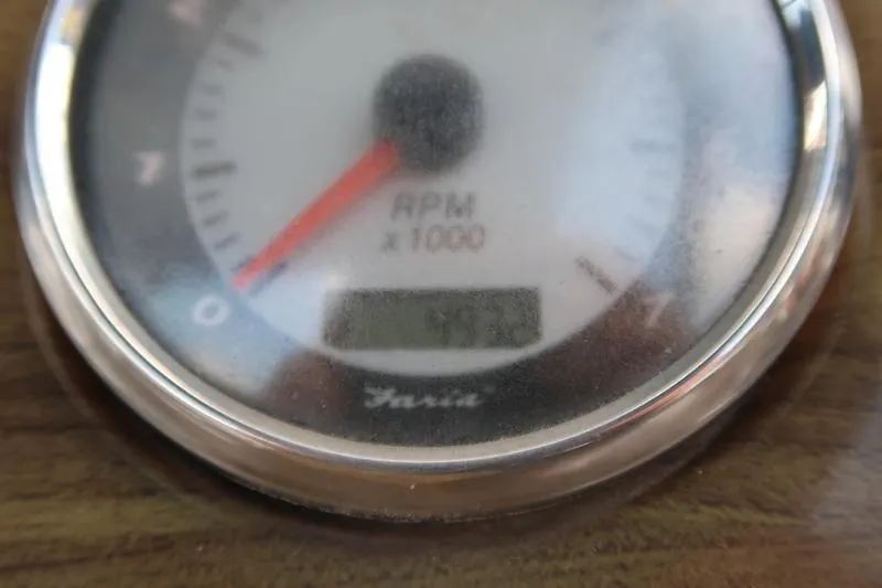Slide: The Image of Close-up of RPM gauge on 2012 Manitou 24 Oasis Tri-Toon boat. - 18