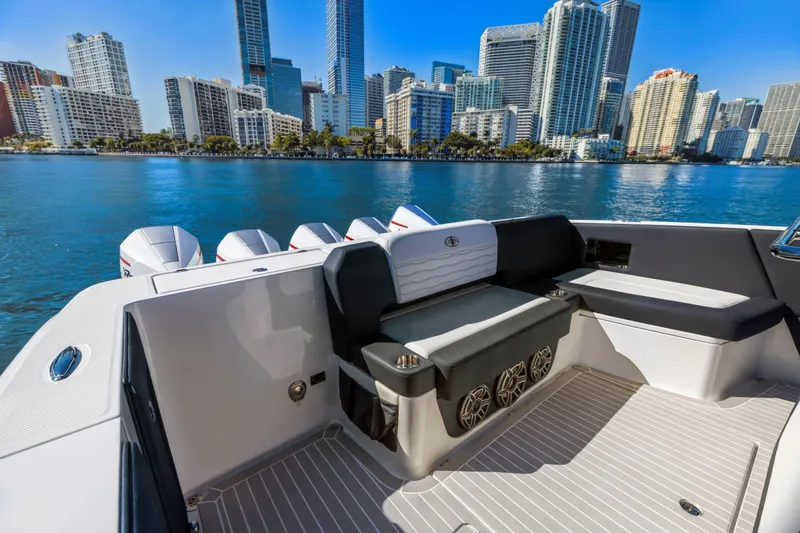 Slide: The Image of 2022 Cigarette 42 Auroris boat interior with city skyline in the background. - 13