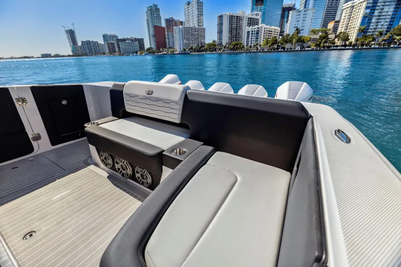 Slide: The Image of 2022 Cigarette 42 Auroris boat interior with city skyline in the background. - 14