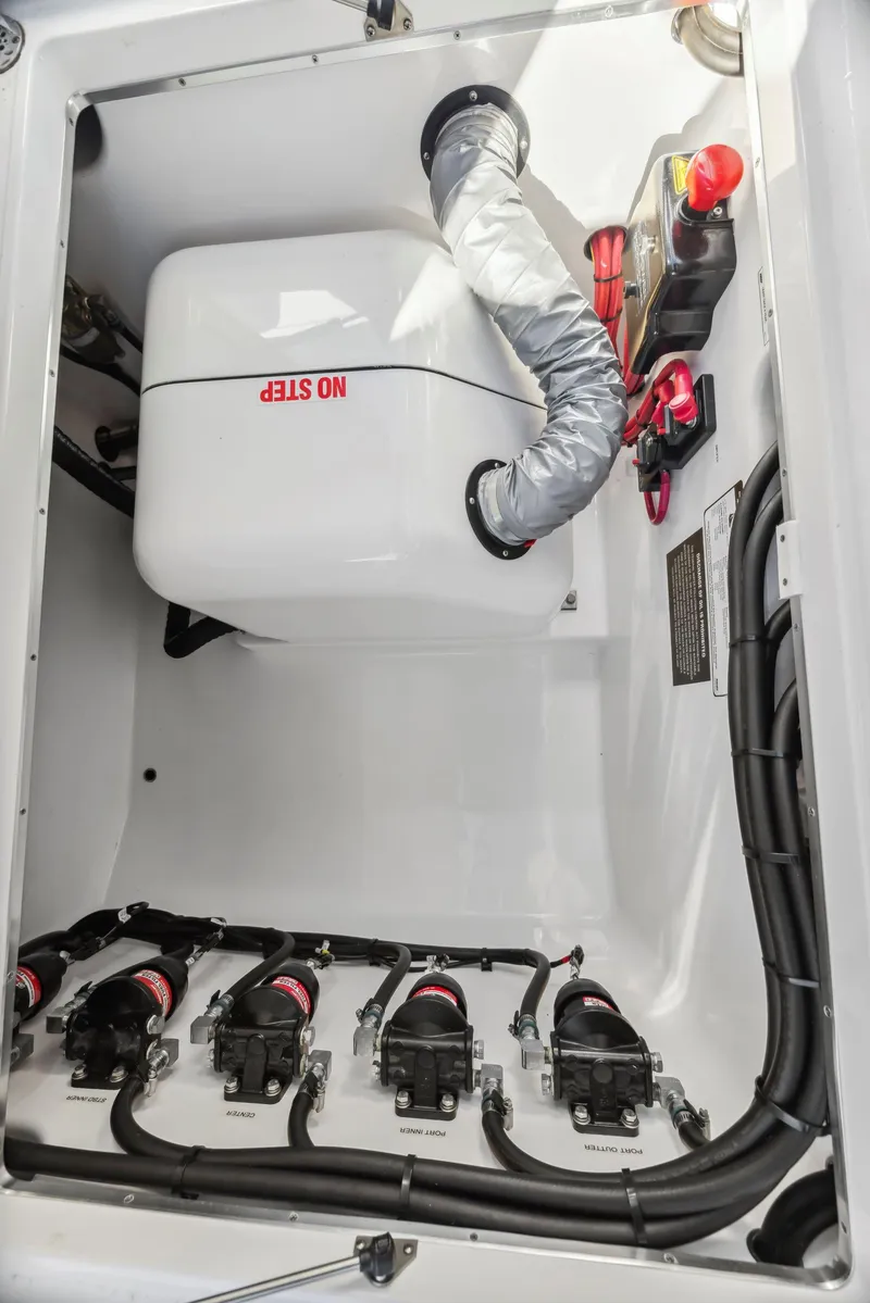 Slide: The Image of Engine compartment of 2022 Cigarette 42 Auroris boat, featuring advanced mechanical components. - 27