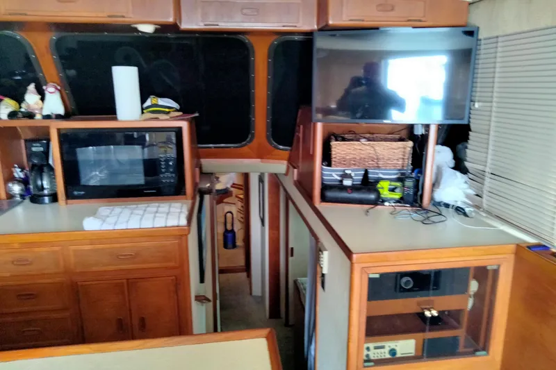 Slide: The Image of Interior of 1985 50' Pacifica Long Range Sportfisherman with kitchen and entertainment area. - 16