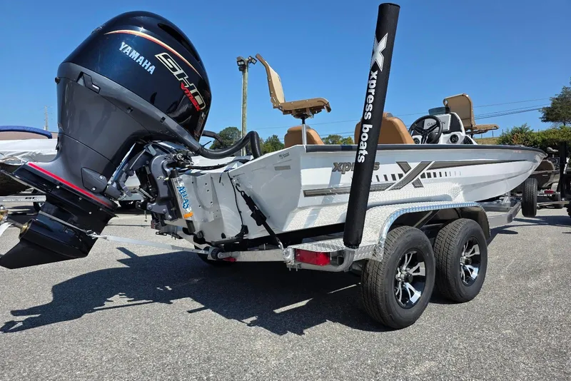 Slide: The Image of 2026 Xpress H20C Crappie boat with Yamaha engine on a trailer. - 10