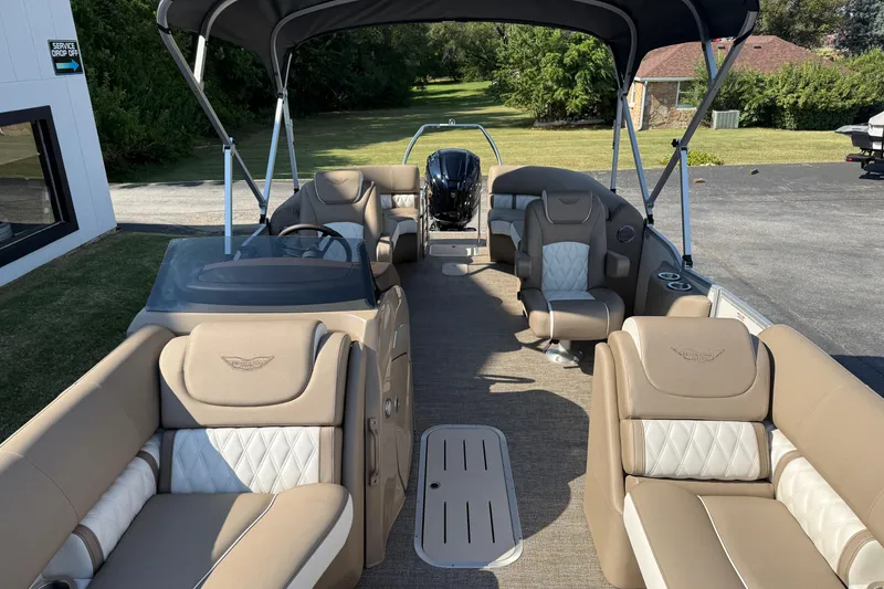 Slide: The Image of 2025 Bennington 23 LXSFB pontoon boat with luxurious seating and canopy. - 10