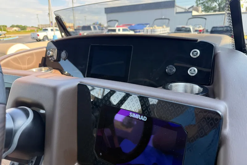 Slide: The Image of Dashboard of 2025 Bennington 23 LXSFB boat with Simrad display and controls. - 22