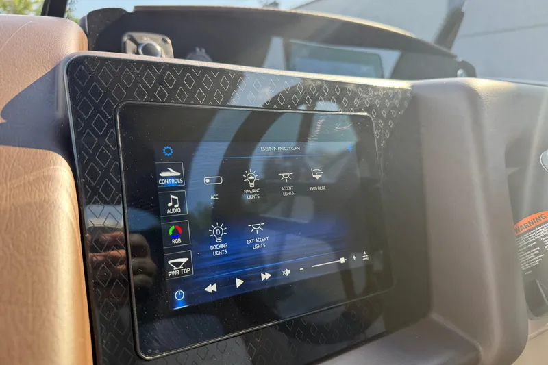 Slide: The Image of Touchscreen control panel of 2025 Bennington 23 LXSFB boat, displaying various settings. - 23