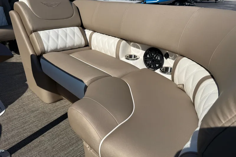 Slide: The Image of Luxurious seating on 2025 Bennington 23 LXSFB boat with cup holders and speaker. - 28