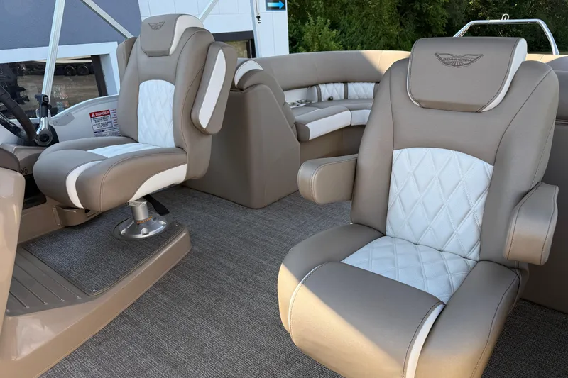 Slide: The Image of 2025 Bennington 23 LXSFB boat interior with luxurious seating and modern design. - 29