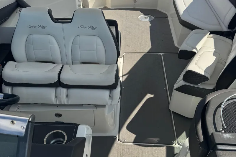 Slide: The Image of 2016 Sea Ray 350 SLX interior with white leather seating and modern design. - 13