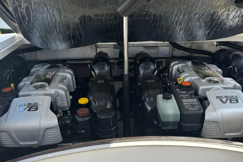 Slide: The Image of Engine compartment of a 2016 Sea Ray 350 SLX with dual Big Block V8 engines. - 8