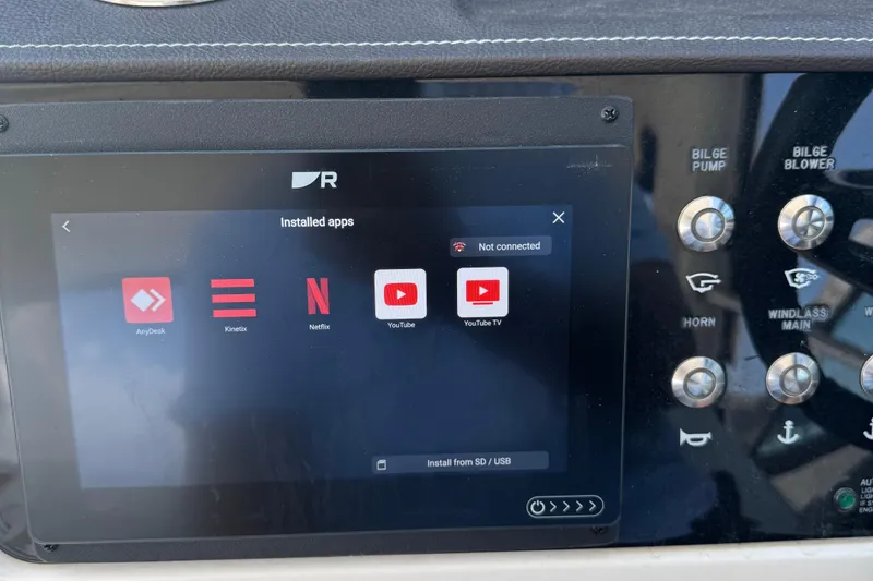 Slide: The Image of Dashboard of a 2016 Sea Ray 350 SLX with installed apps display. - 9