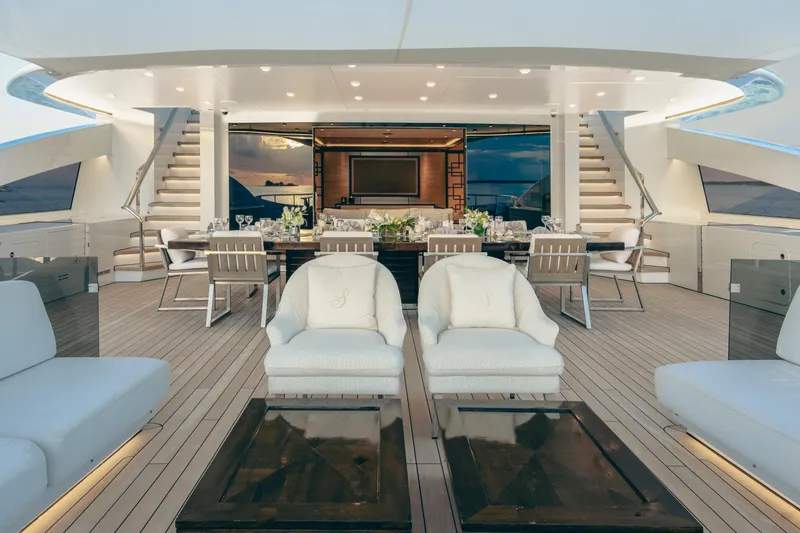 Slide: The Image of Luxurious Alia Yachts 60M 2016 deck with elegant seating and dining area. - 16
