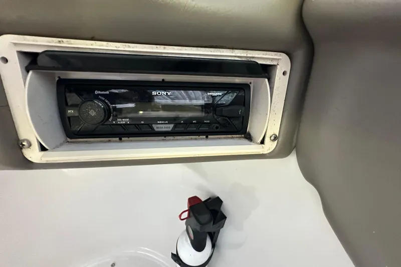 Slide: The Image of Sony stereo system in a 2005 Crownline 270 BR boat dashboard. - 26
