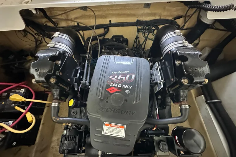 Slide: The Image of Engine of 2005 Crownline 270 BR boat, featuring MerCruiser 350 MAG MPI. - 35