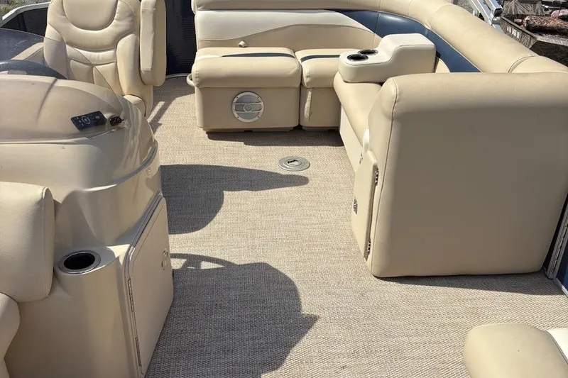 Slide: The Image of Interior of 2016 Godfrey SWEETWATER 2086 pontoon boat with beige seating and carpet. - 8