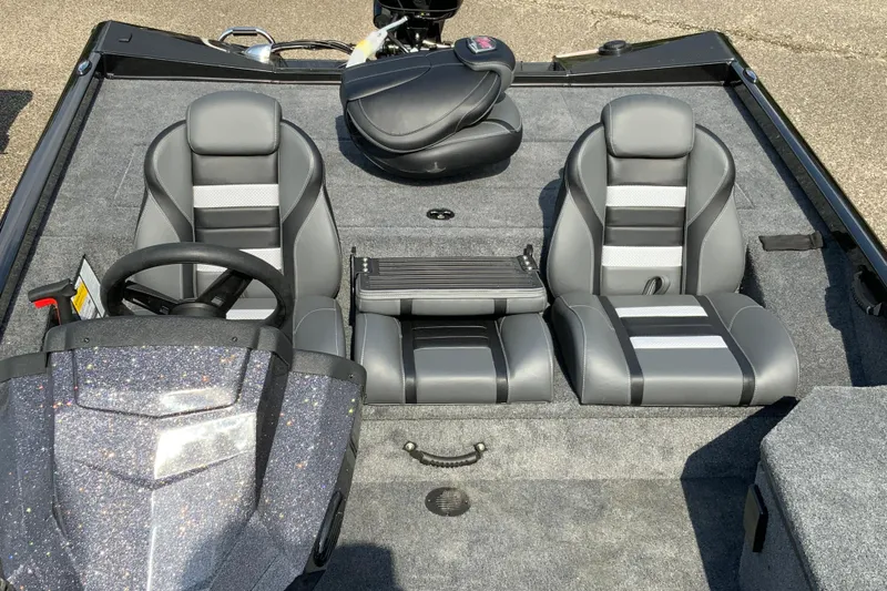 Slide: The Image of 2026 Ranger RT178 boat interior with gray seating and steering wheel. - 11