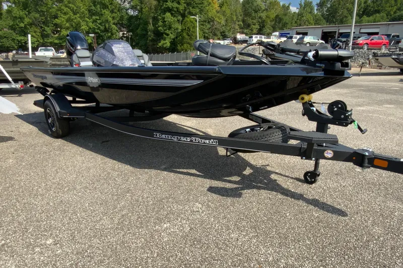 Slide: The Image of 2026 Ranger RT178 boat on trailer in outdoor setting. - 2