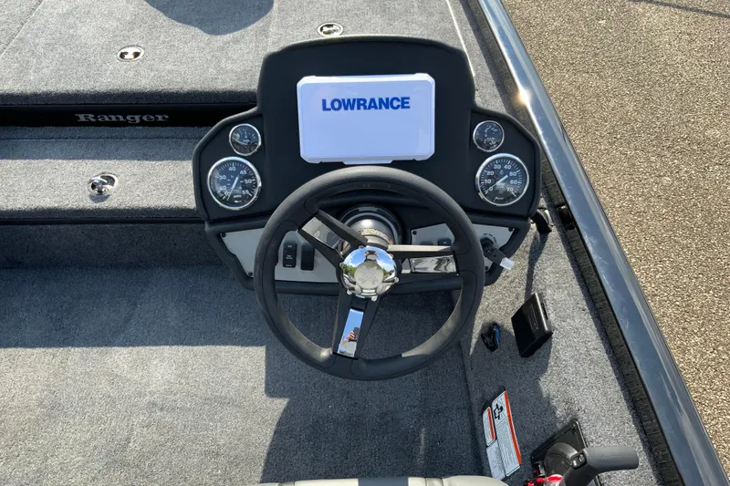 Slide: The Image of Steering console of 2026 Ranger RT178 boat with Lowrance display and gauges. - 7