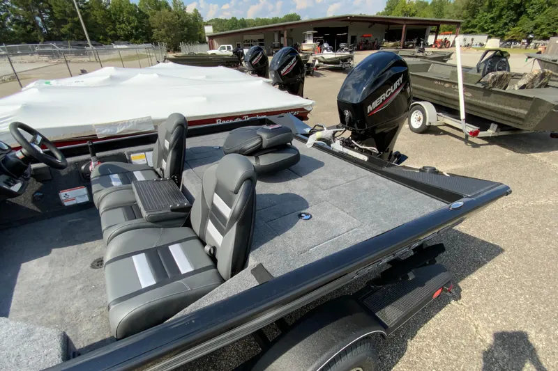 Slide: The Image of 2026 Ranger RT178 boat with Mercury engine, featuring spacious seating and sleek design. - 9