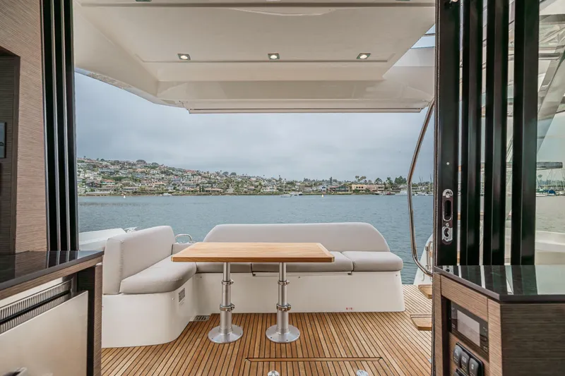 Slide: The Image of Luxurious 2021 Prestige 420 Fly yacht interior with scenic waterfront view. - 34