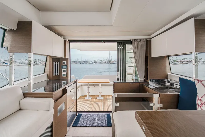 Slide: The Image of Luxurious interior of 2021 Prestige 420 Fly yacht with marina view. - 36