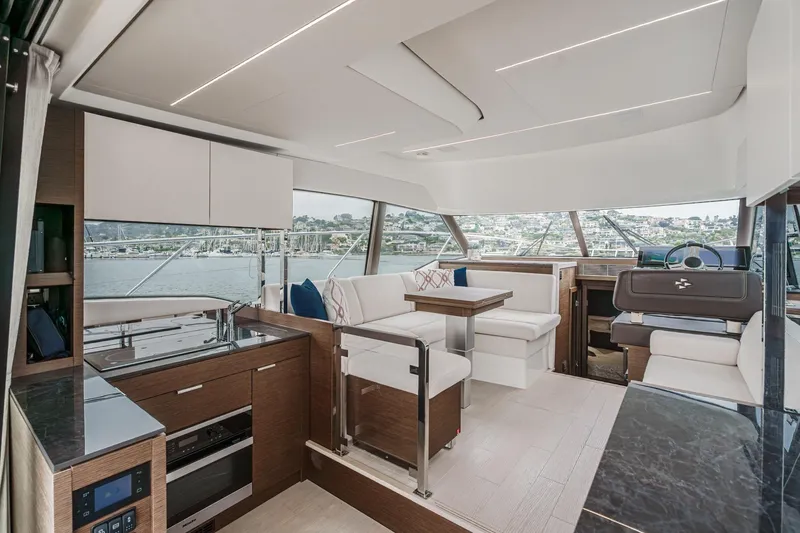 Slide: The Image of Luxurious interior of 2021 Prestige 420 Fly yacht with modern seating and panoramic views. - 39