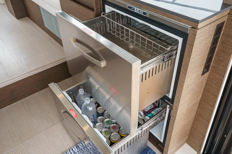 Slide: The Image of Built-in drawer refrigerator on 2021 Prestige 420 Fly yacht, stocked with beverages. - 45