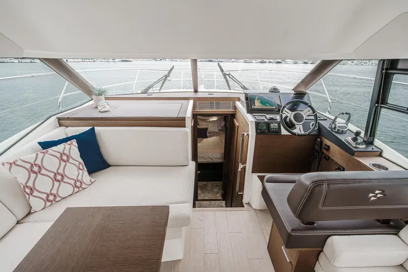 Slide: The Image of Luxurious interior of 2021 Prestige 420 Fly yacht with modern helm and seating area. - 57