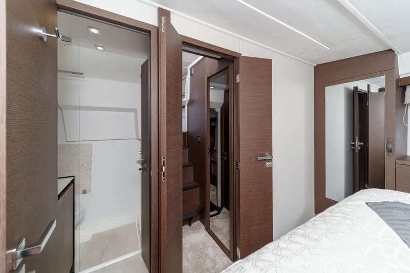 Slide: The Image of Interior of 2021 Prestige 420 Fly yacht with modern bathroom and wooden finishes. - 61