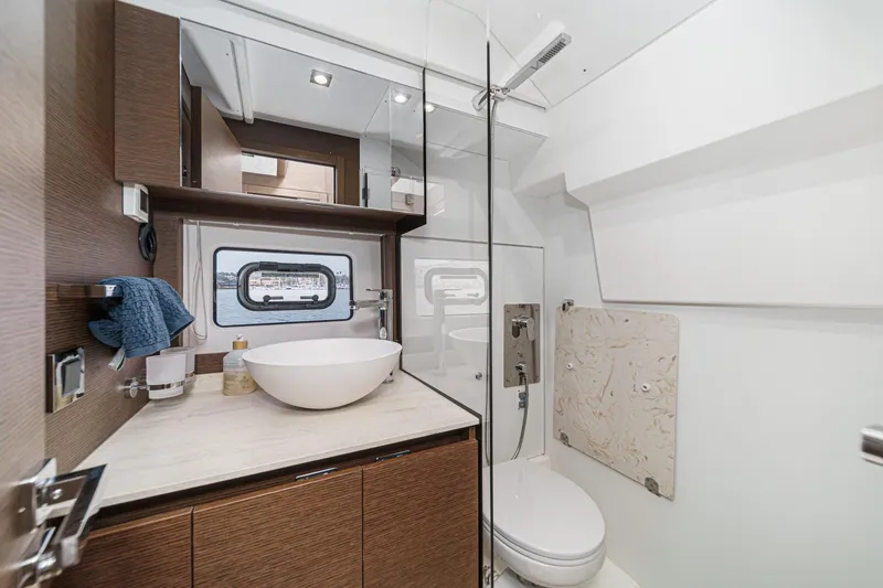 Slide: The Image of Luxurious bathroom in 2021 Prestige 420 Fly yacht with modern fixtures and elegant design. - 62