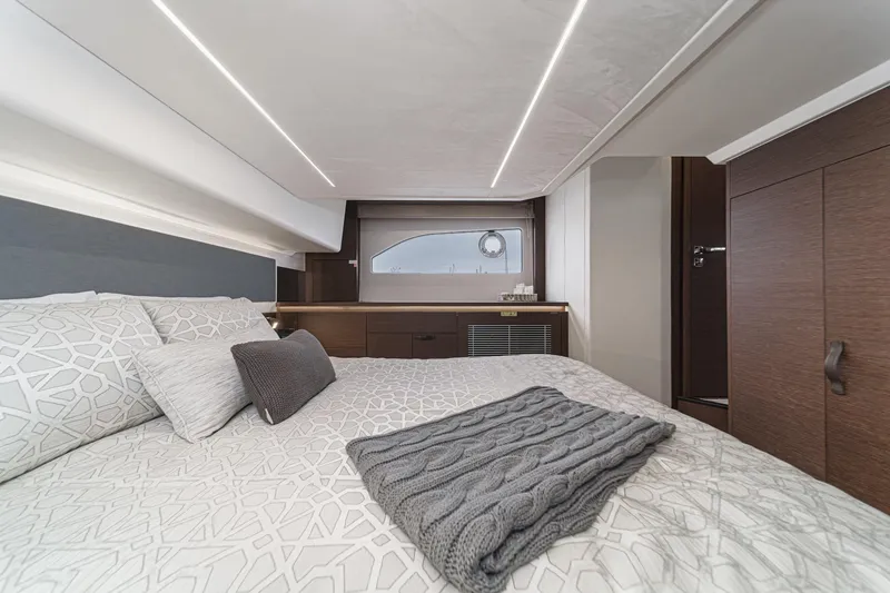 Slide: The Image of Luxurious bedroom interior of 2021 Prestige 420 Fly yacht with modern design. - 65
