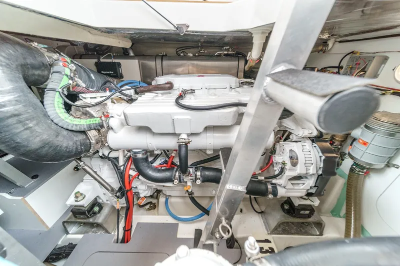 Slide: The Image of Engine room of 2021 Prestige 420 Fly yacht, showcasing mechanical components and wiring. - 69