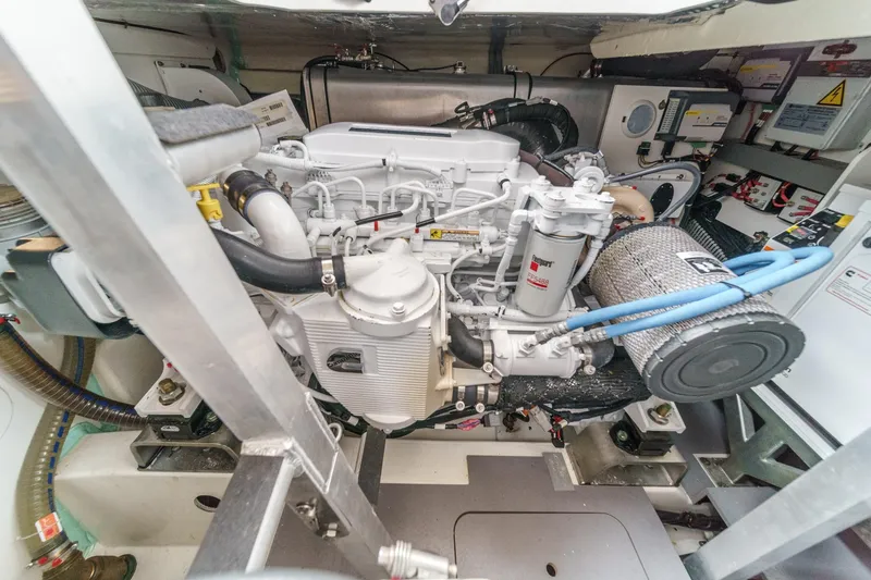 Slide: The Image of Engine room of 2021 Prestige 420 Fly yacht, showcasing detailed mechanical components. - 70