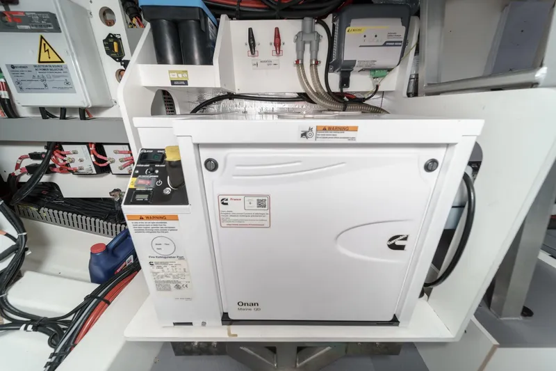 Slide: The Image of Engine room of 2021 Prestige 420 Fly yacht with Onan marine generator. - 71